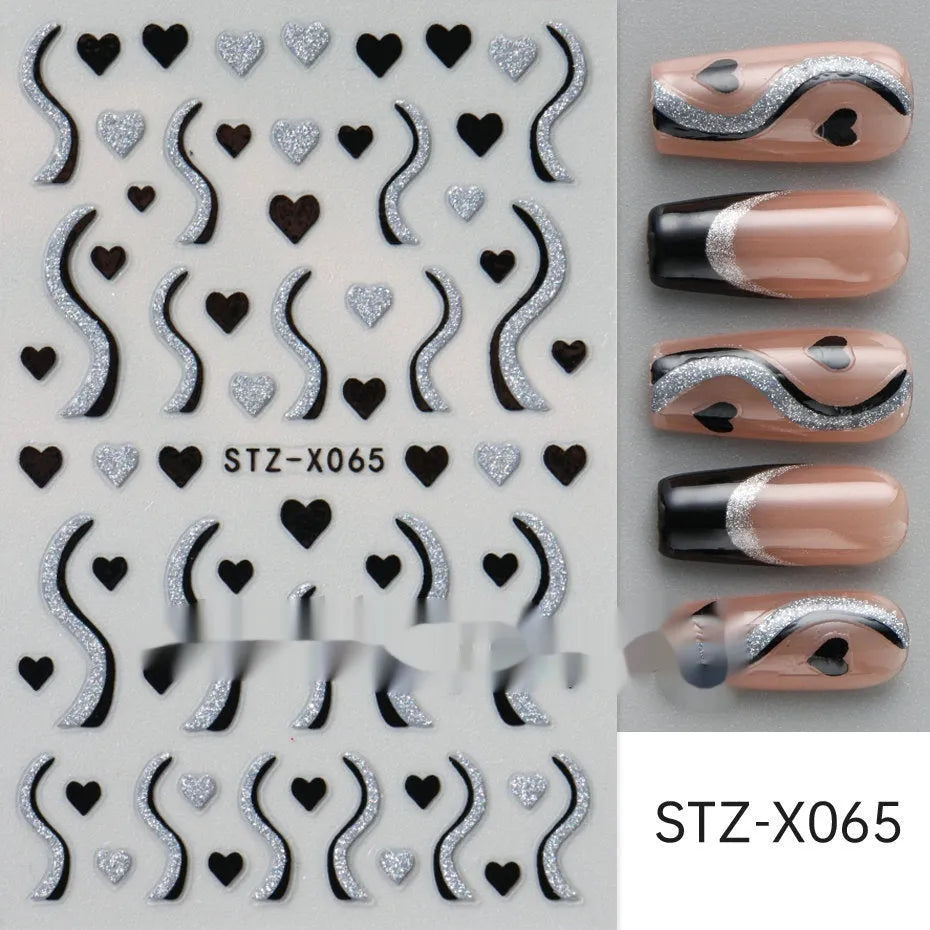 Assortment of black and silver nail sticker designs including cartoon and French tip patterns on a plastic sheet.