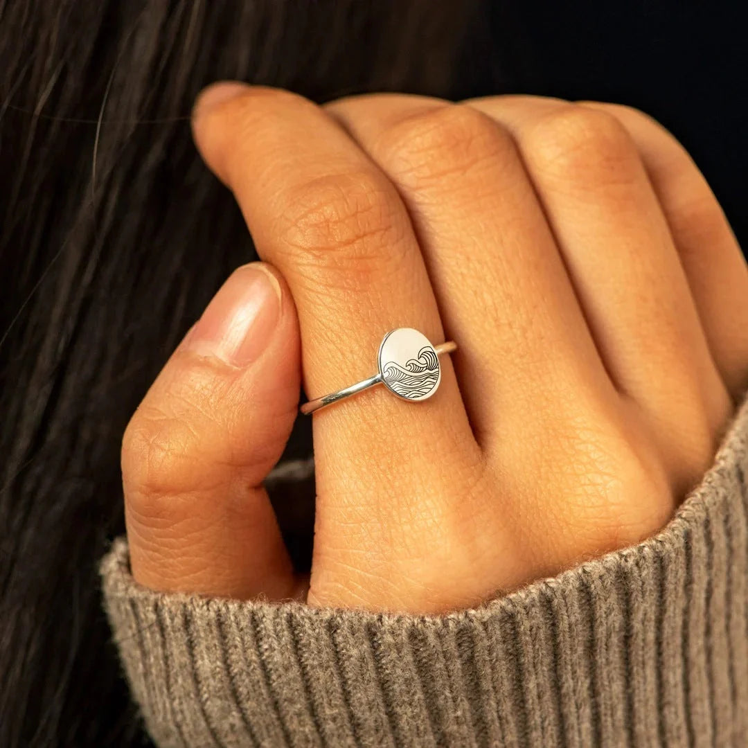 Sterling silver ring with elegant wave-inspired design, inspired by the natural beauty of the British coastline