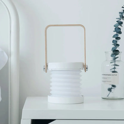 Foldable touch dimmable LED night light showing table lamp and lantern configurations