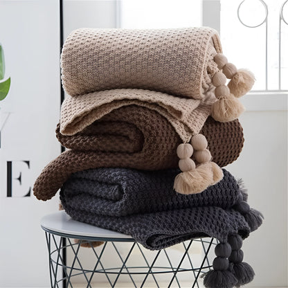 Nordic fringed knit ball acrylic blanket in beige colour measuring 130×170cm