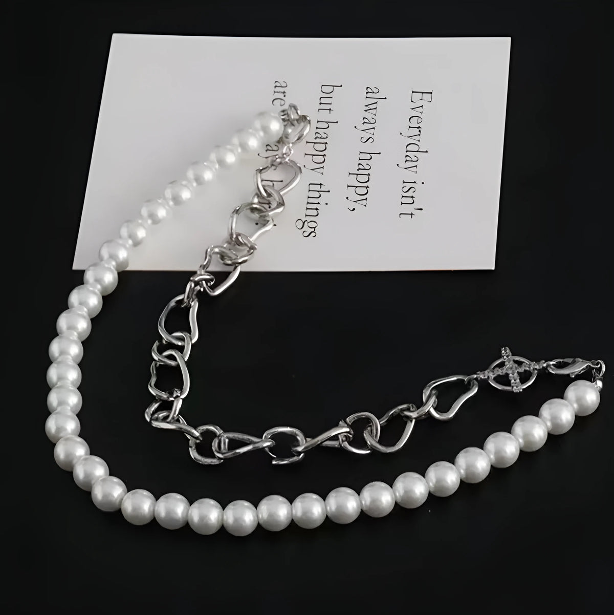 White geometric acrylic clavicle chain necklace with asymmetric design and twisted chain style