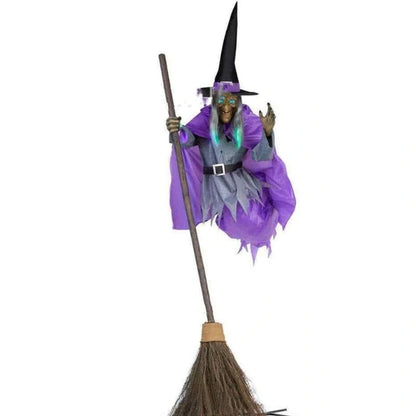 Floating witch Halloween decoration with broom, lifelike scary face, and purple hovering skirt