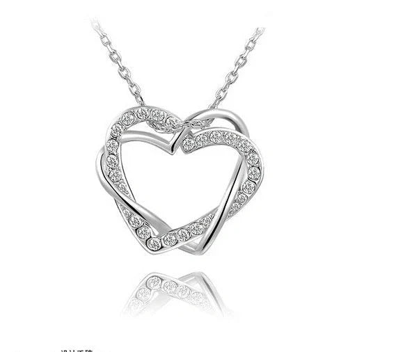 Double Diamond Heart Necklace and Earring Set in gold and silver finishes