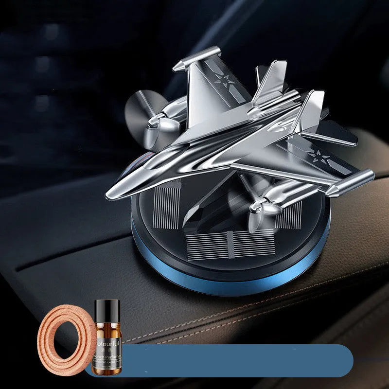 Solar-powered rotating perfume ornament in fighter jet design with aluminium alloy seat and essential oil bottle