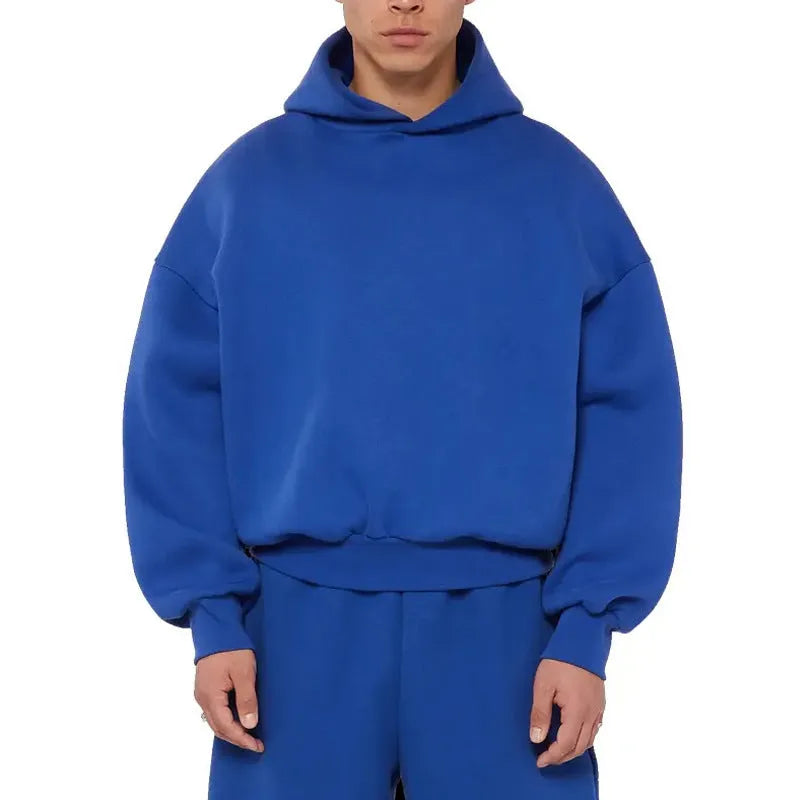 Men's grey fleece-lined cotton pullover hoodie with a wool lining and long sleeves