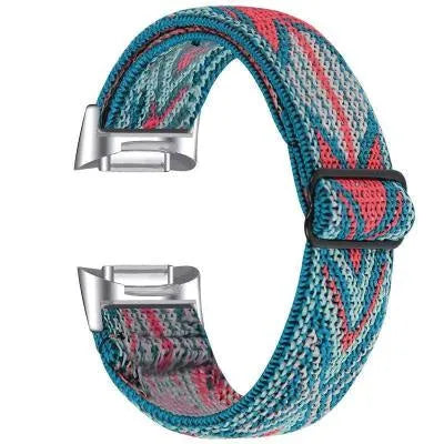 Printed elastic watch strap compatible with Fitbit Charge 6 shown in adjustable position
