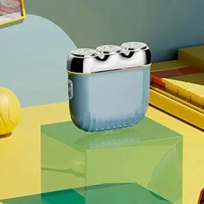 Mini electric shaver with three floating heads in gun colour, orange, green, or blue options