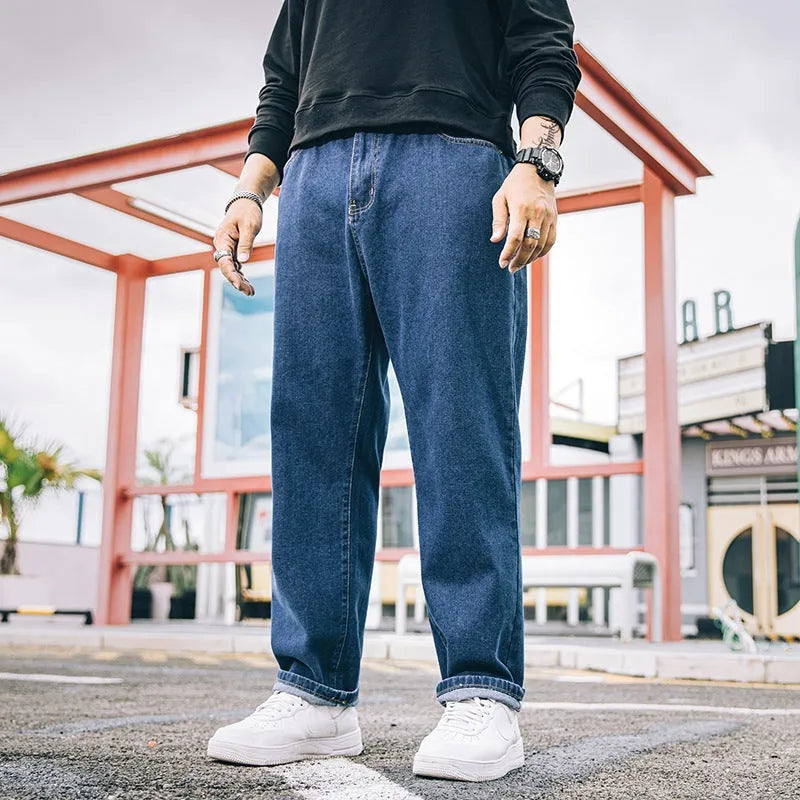 Men's loose straight jeans in dark blue colour showing relaxed fit and traditional styling