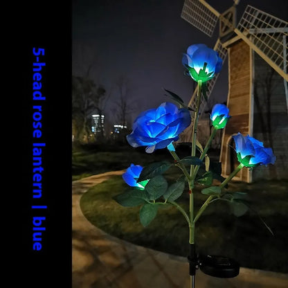 Colourful solar-powered LED lawn lamp in a flower shape for garden decoration.