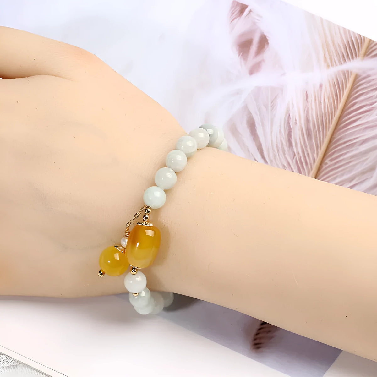 Geometric women's bracelet with hanging agate tassel and 14K gilded elements