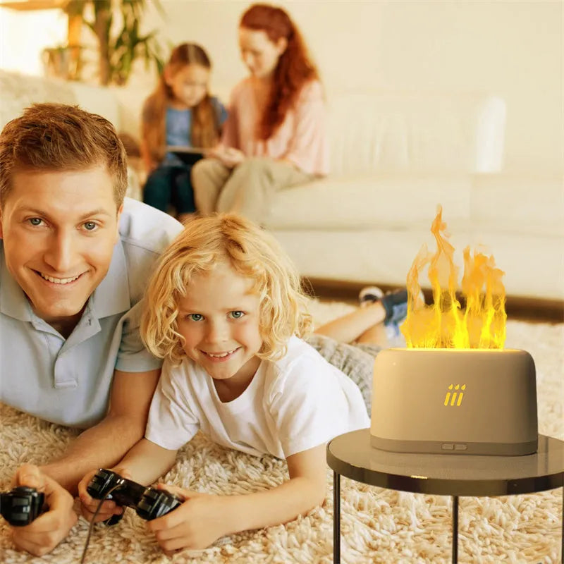 Black ultrasonic flame aroma diffuser humidifier with LED lights on a wooden table