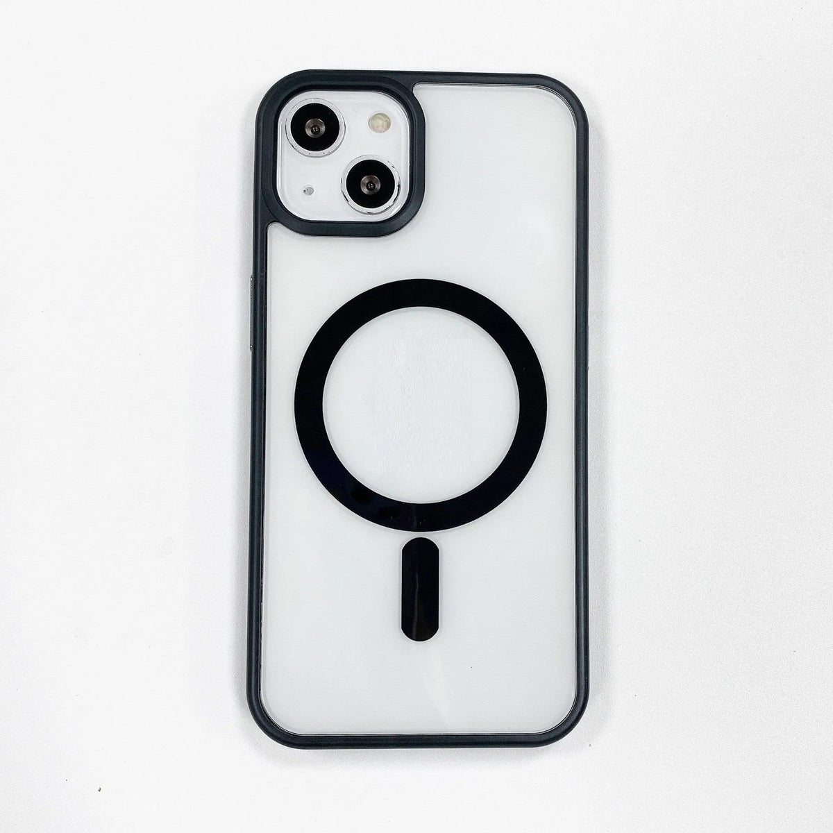 Clear acrylic MagSafe phone case for iPhone showing magnetic ring, displayed in pink, blue, white, black, and navy blue colour options.