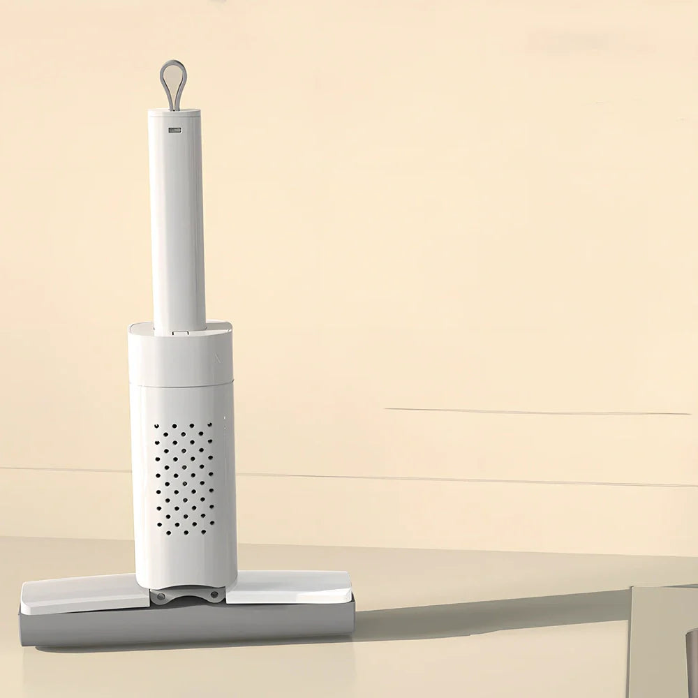 Handheld mini mop with 15cm rubber cotton head and folding squeeze mechanism for compact storage
