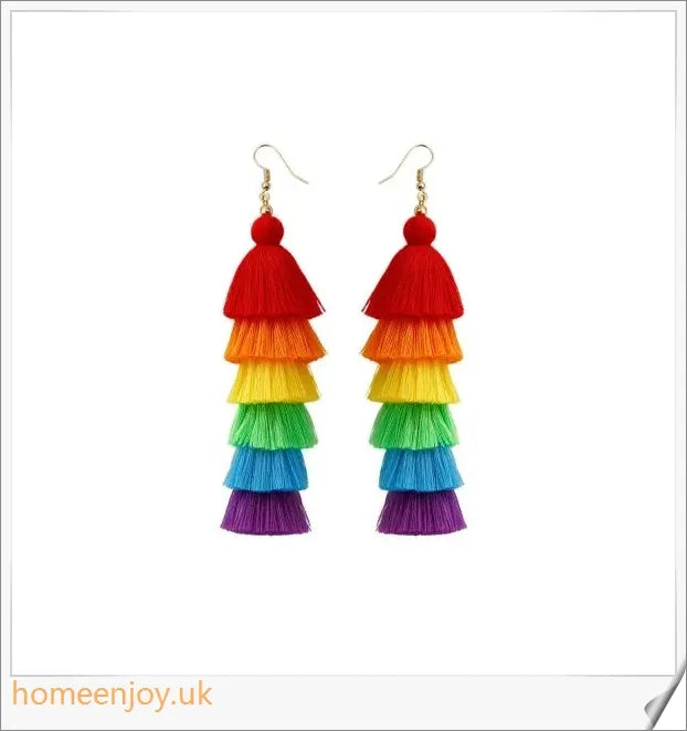 Vibrant bohemian-inspired tassel earrings in rainbow and rose colours, perfect for summer fashion and vacations