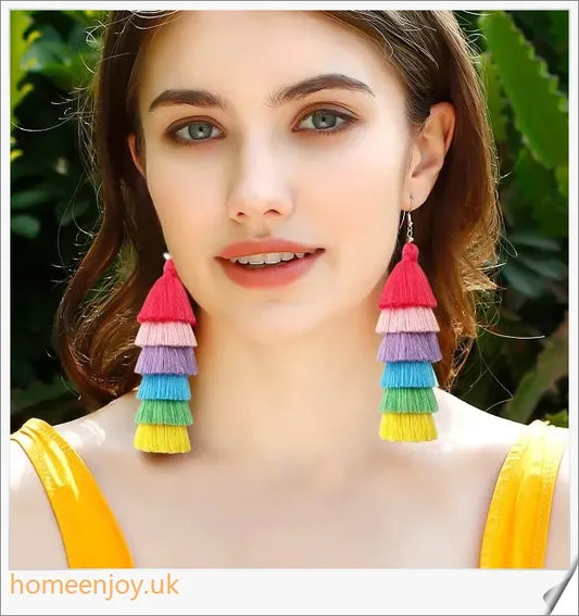 Vibrant bohemian-inspired tassel earrings in rainbow and rose colours, perfect for summer fashion and vacations