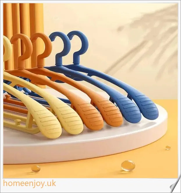A set of 5 multi-functional, non-slip clothes hangers in a sleek and modern design