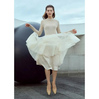 Elegant Fairy Gauze A-Line Skirt in Orange Beige and White colours, featuring a minimalist design and ankle-length A-line silhouette