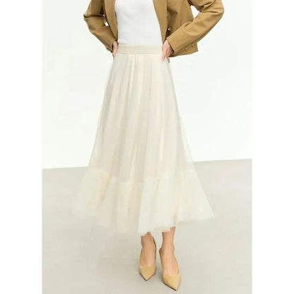 Elegant Fairy Gauze A-Line Skirt in Orange Beige and White colours, featuring a minimalist design and ankle-length A-line silhouette