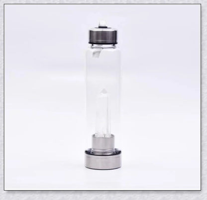 A handcrafted glass water bottle infused with natural crystals, offering a unique and sustainable hydration experience.