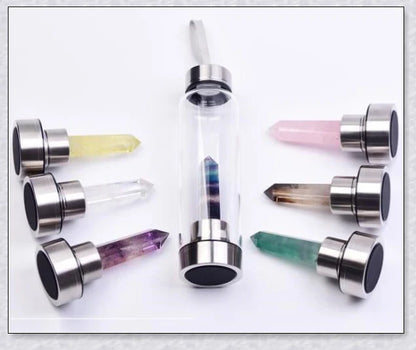 A handcrafted glass water bottle infused with natural crystals, offering a unique and sustainable hydration experience.