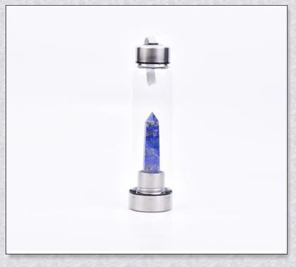 A handcrafted glass water bottle infused with natural crystals, offering a unique and sustainable hydration experience.