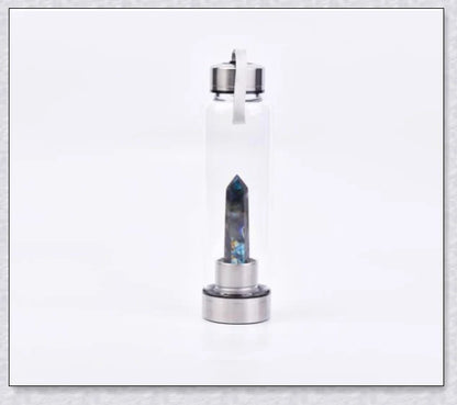 A handcrafted glass water bottle infused with natural crystals, offering a unique and sustainable hydration experience.
