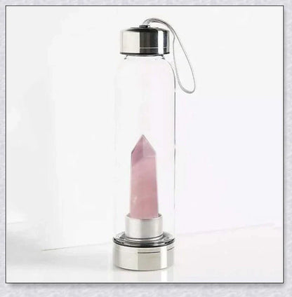 A handcrafted glass water bottle infused with natural crystals, offering a unique and sustainable hydration experience.