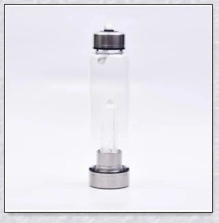 A handcrafted glass water bottle infused with natural crystals, offering a unique and sustainable hydration experience.