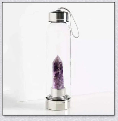 A handcrafted glass water bottle infused with natural crystals, offering a unique and sustainable hydration experience.