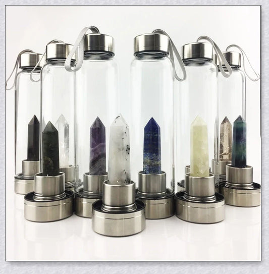 A handcrafted glass water bottle infused with natural crystals, offering a unique and sustainable hydration experience.