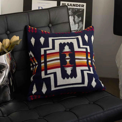 Geometric-patterned cushion cover made of soft, breathable 100% cotton