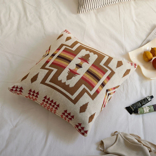 Geometric-patterned cushion cover made of soft, breathable 100% cotton