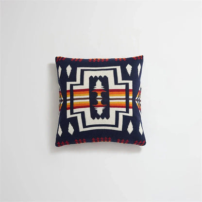 Geometric-patterned cushion cover made of soft, breathable 100% cotton