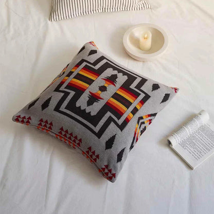 Geometric-patterned cushion cover made of soft, breathable 100% cotton