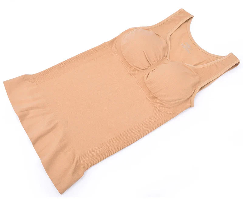 A close-up image of a black compression vest with a built-in bra, designed to sculpt and support the figure.