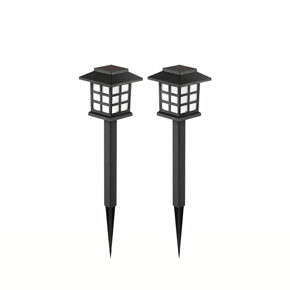 Elegant, eco-friendly solar-powered LED pathway lights illuminating a garden walkway