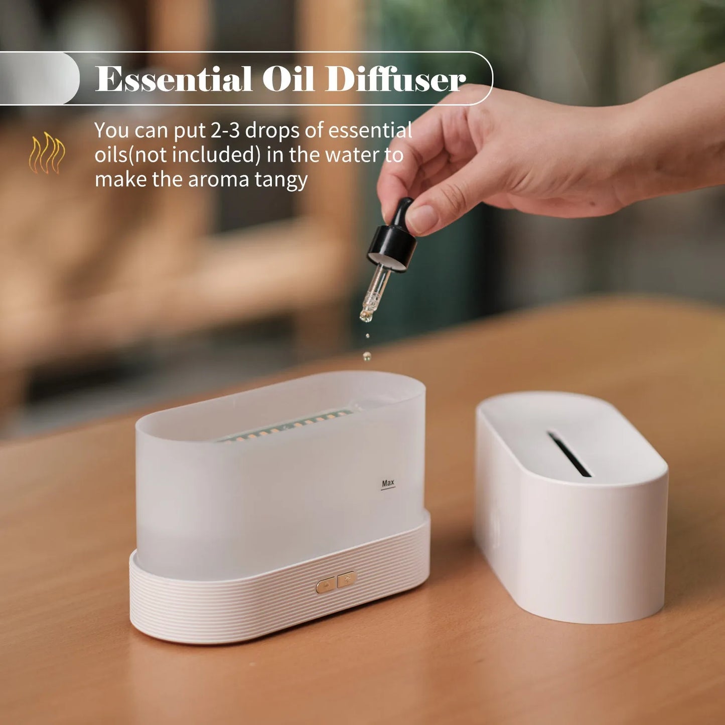 Black square ultrasonic aroma diffuser with flame light effect and mist output.