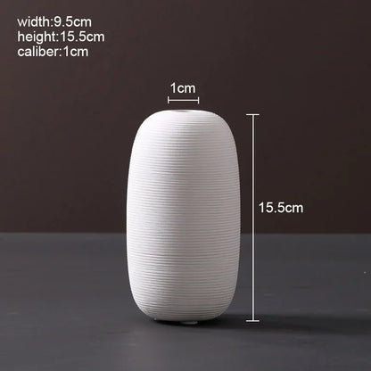 Modern Scandinavian ceramic vase with textured inlay surface decoration