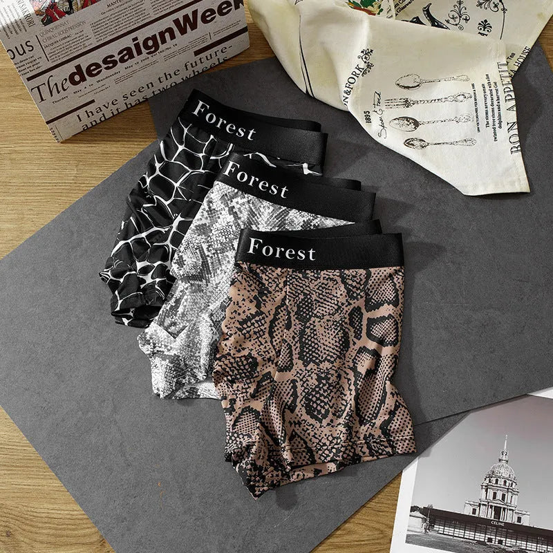 Men's loose fit polyester boxer shorts in black colour showing mid-waist design
