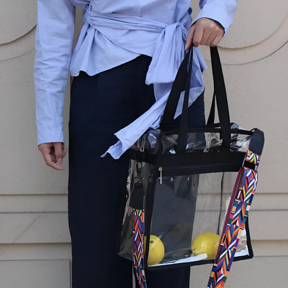 Clear PVC women's messenger bag with a coloured front panel and double shoulder straps.