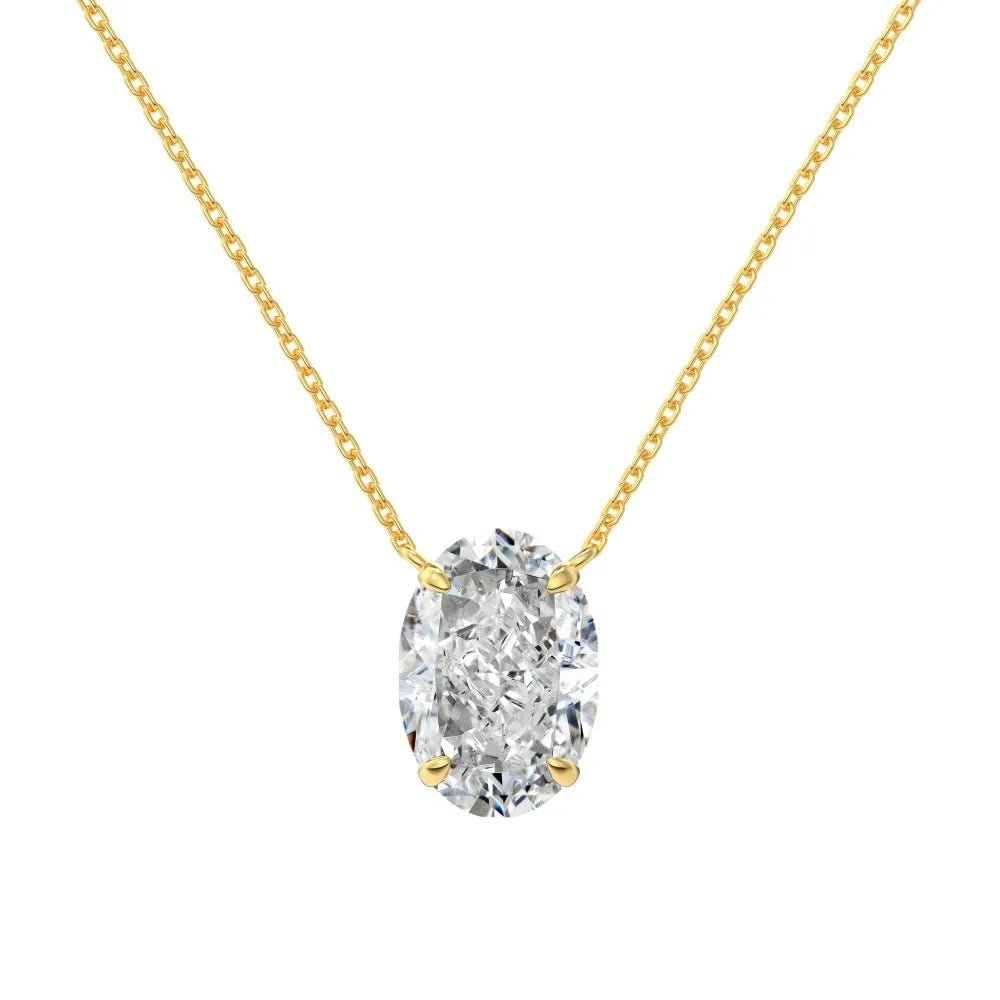 Close-up of a geometric oval ice flower pendant on a sterling silver necklace, showing gold or platinum finish.