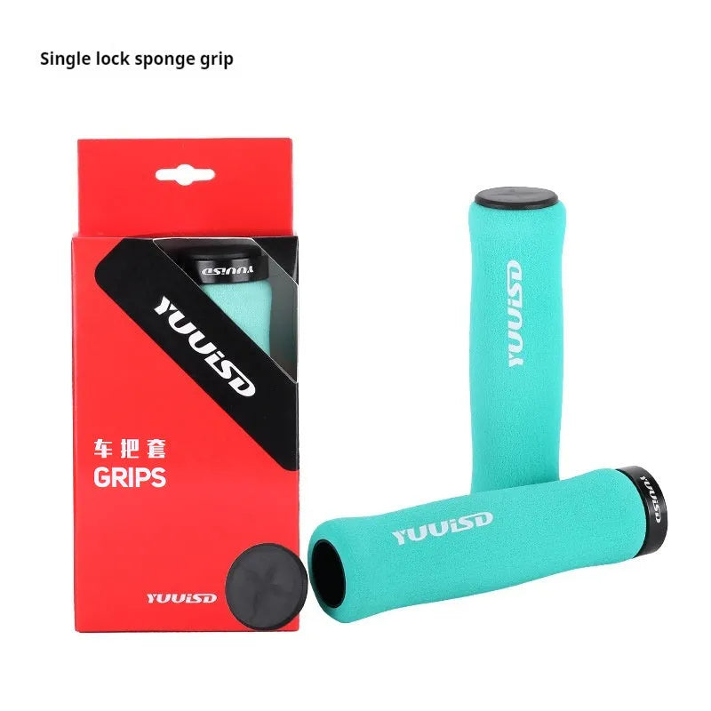 Mountain bike handle cover in soft sponge material with shock absorber design