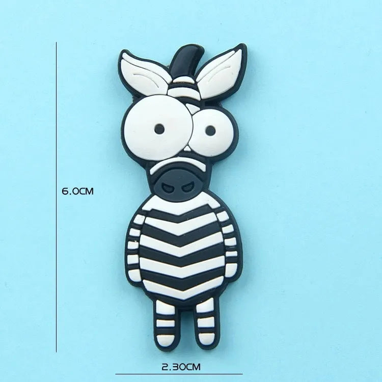 Nine PVC soft rubber cartoon animal fridge stickers including monkey, crocodile, leopard, lion, zebra, elephant, giraffe, and ostrich.
