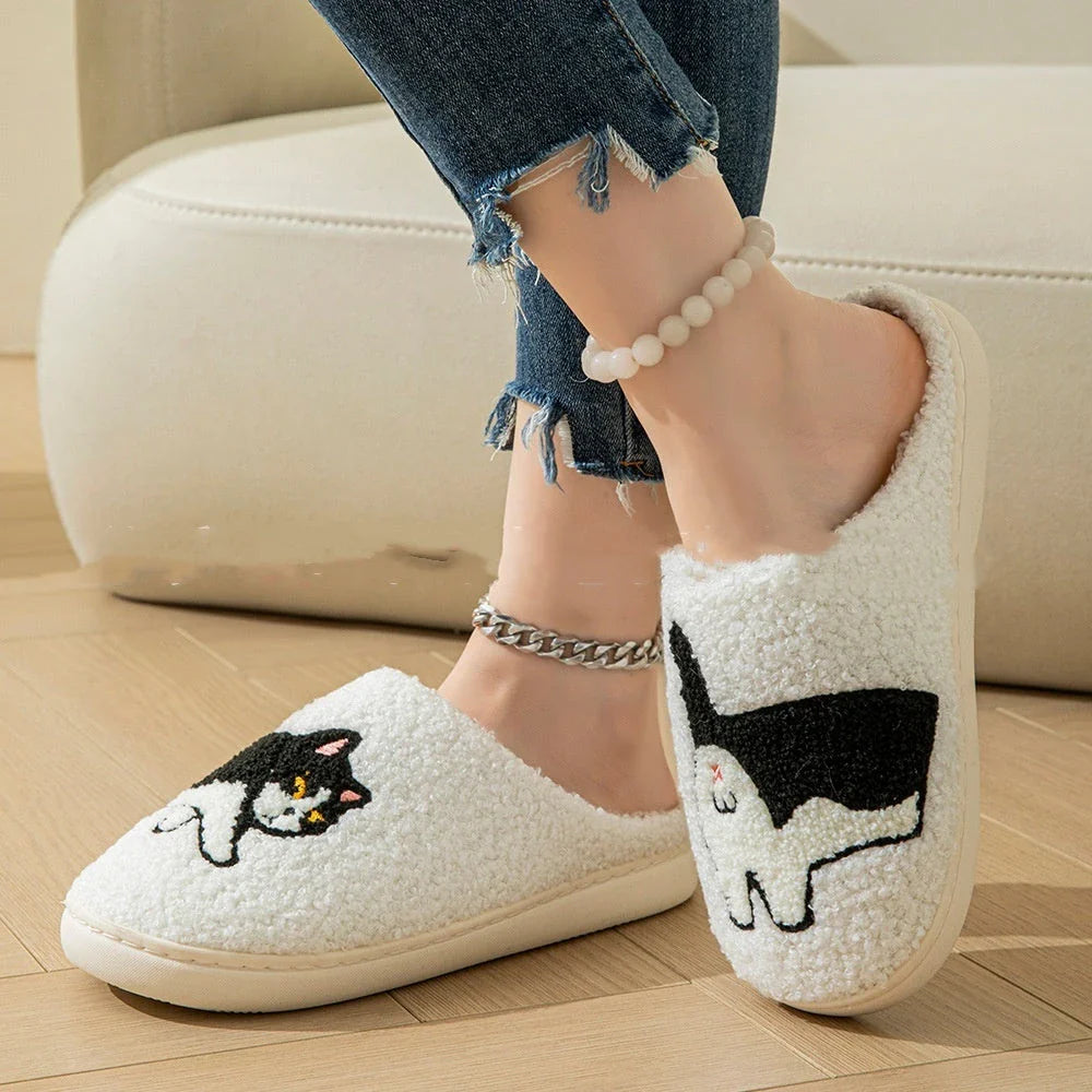 Cozy cotton slippers with cute patterns, plush interior, and non-slip sole for comfortable indoor and outdoor wear