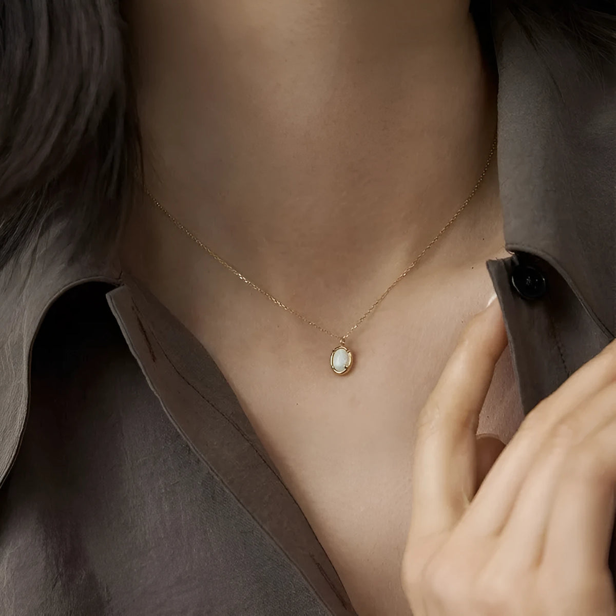 S925 sterling silver oval pendant necklace with jelly opal style, available in gold or white gold plating.