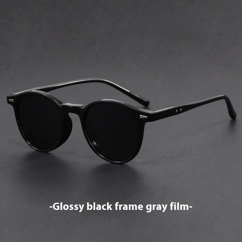 Ultra-light round frame retro sunglasses with polarised grey lenses in multiple colour options