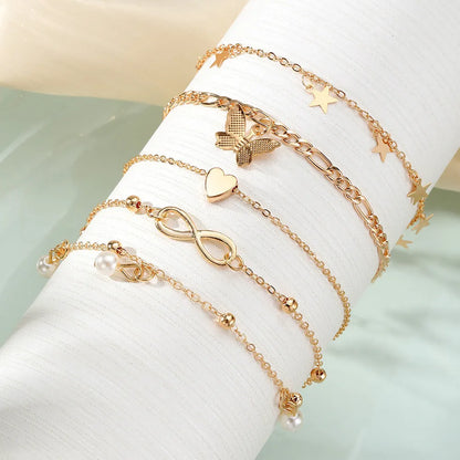 Butterfly love design four-piece alloy anklet set for women with pearl heart details