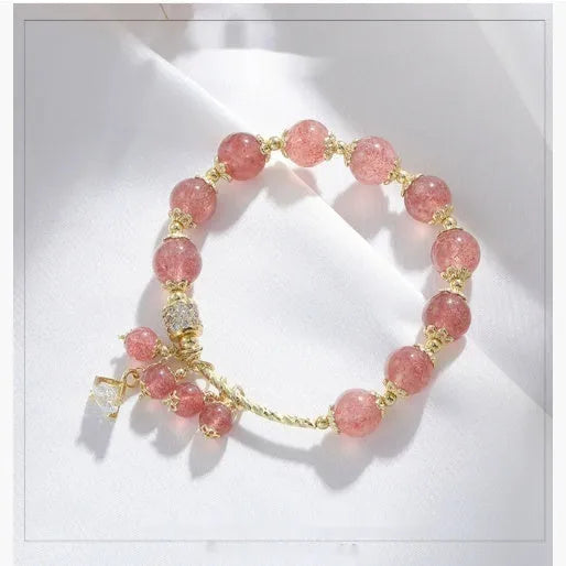 Pink heart-shaped strawberry quartz crystal bracelet with pearl accents for women