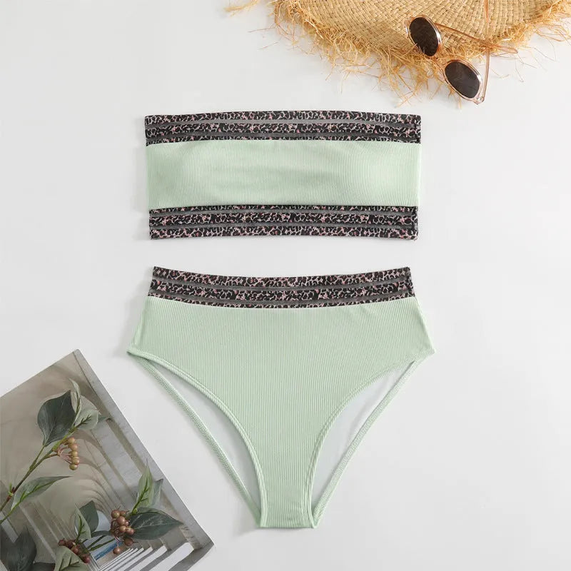 Black strapless bikini with leopard pattern splicing, showing bra and shorts set.