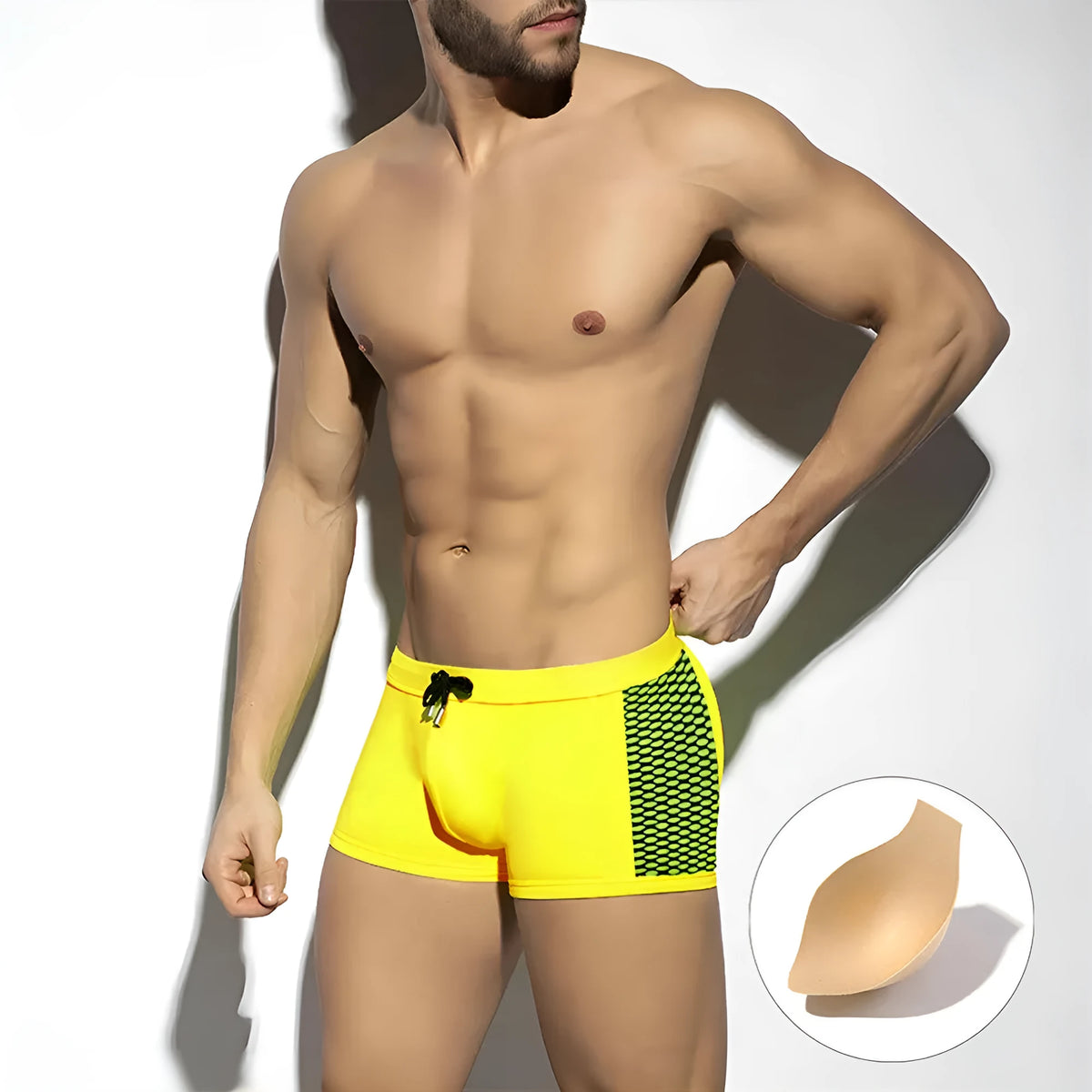 Men's yellow and black polka dot quick-dry swimming boxers with a briefs-style 3D contour fit.